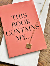Load image into Gallery viewer, gold-chain-necklace-calendar-pendant-personalised-lay-on-book