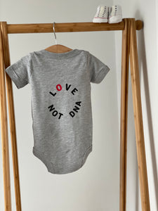 LOVE NOT DNA babygrow