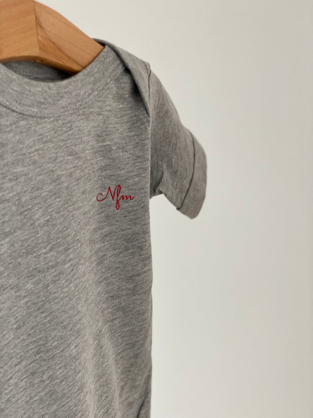 LOVE NOT DNA babygrow