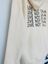 Load image into Gallery viewer, close-up-sand-coloured-hoodie-unisex-reverse-back-detailing

