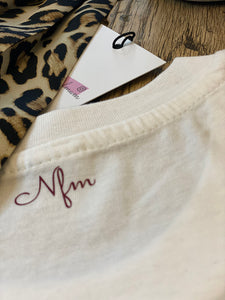 back-of-white-t-shirt-with-nfm-logo-on-neckline-one-of-the-items-from-the-adoption-clothing-range-from-notafictionalmum
