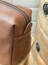 Load image into Gallery viewer, brown-leather-effect-washbag-close-up-on-zip
