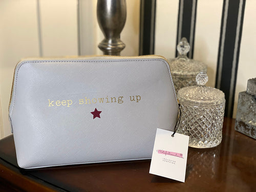 grey-makeup-bag-keep-showing-up-printed-in-gold