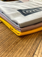 Load image into Gallery viewer, pastel-colour-love-is-love-slogan-tshirts-folded
