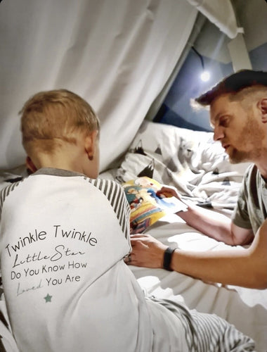 kids-twinkle-star-pyjamas-reading-book-storytime